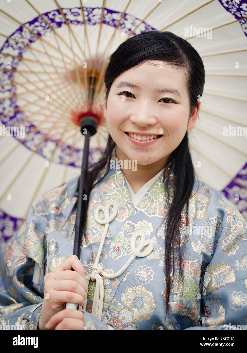 Japanese woman with kimono traditional umbrella at kumamoto castle hires stock photography and