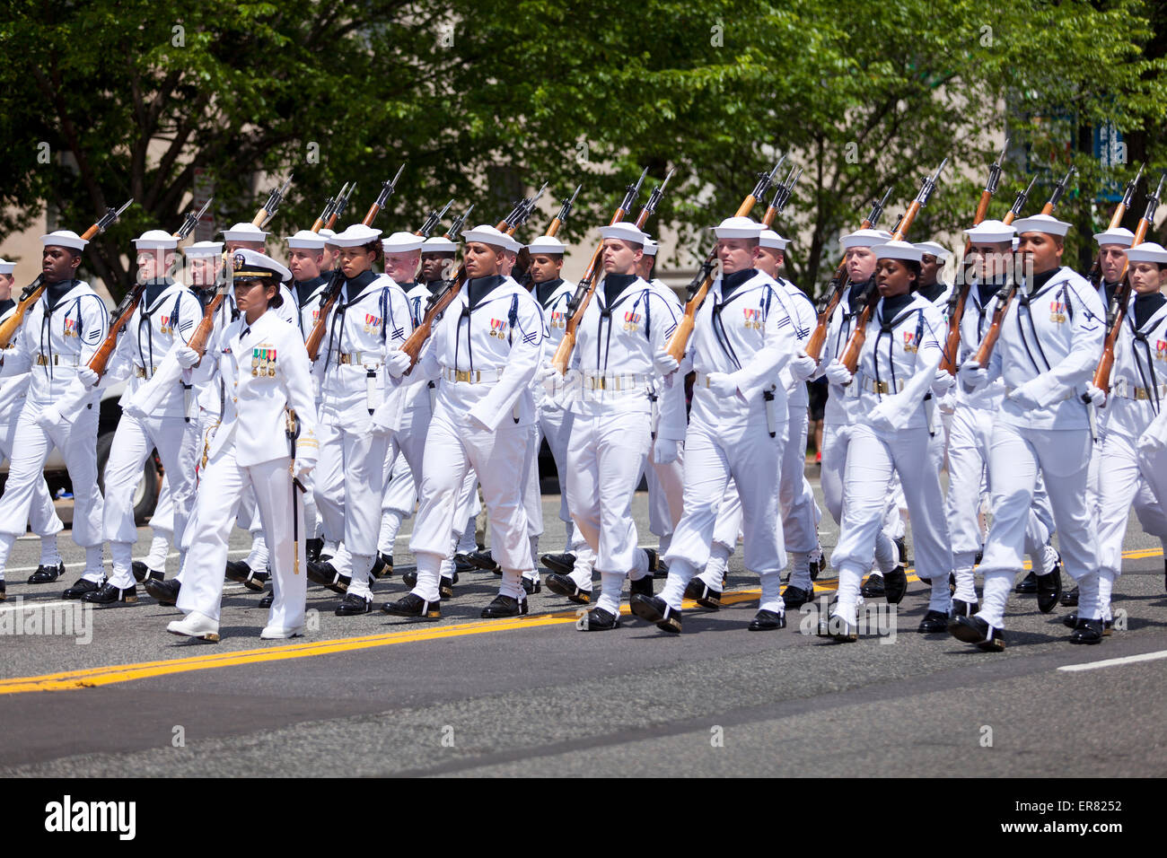 US Navy ceremonial guard drill team marching in Memorial Day parade