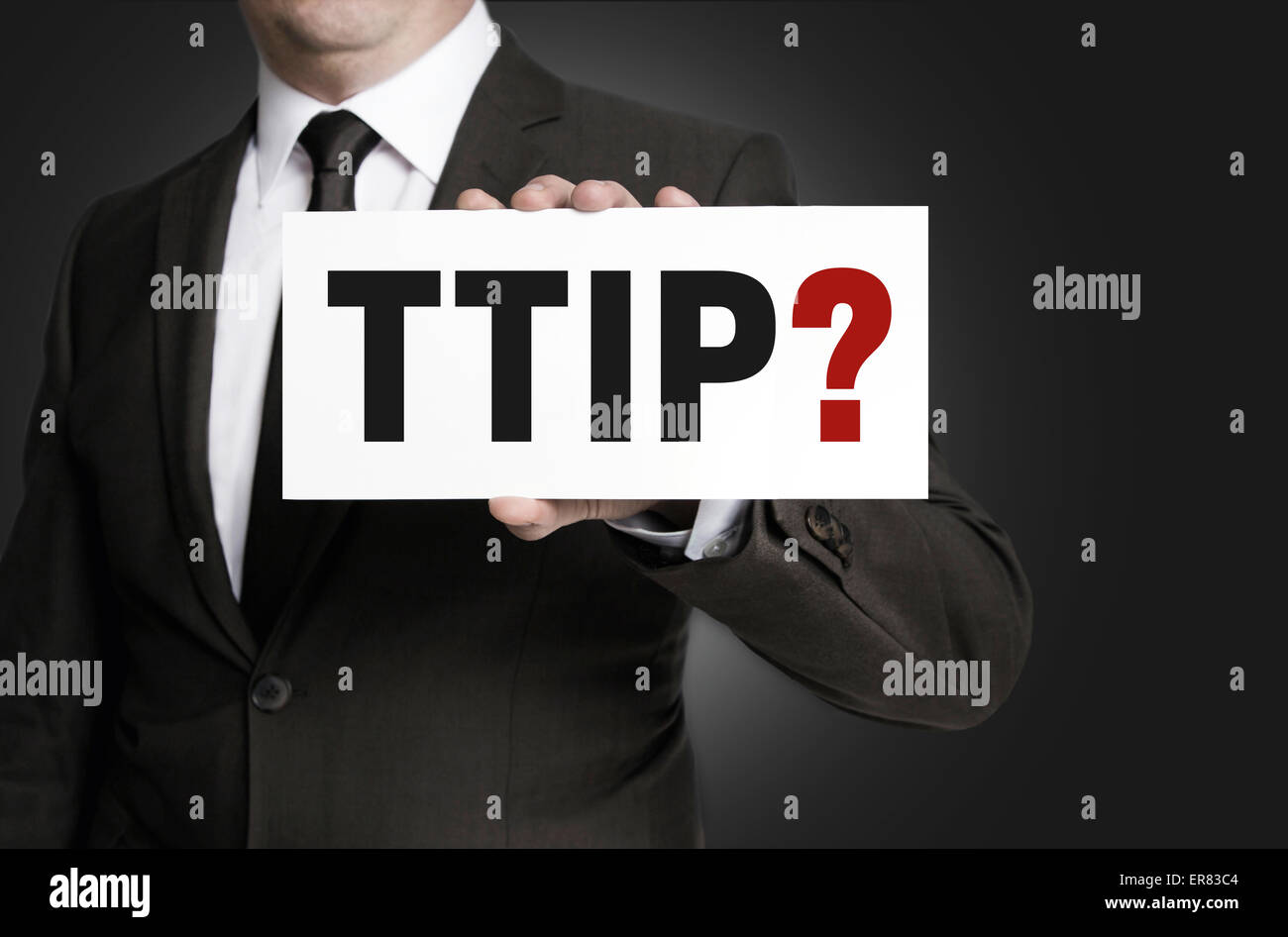 TTIP sign is held by businessman. Stock Photo