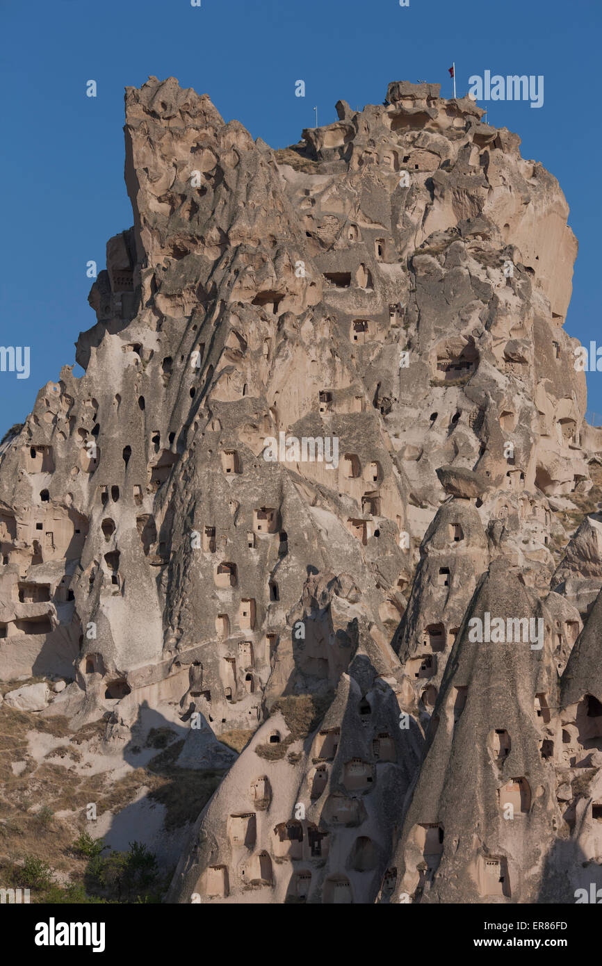 Patterns on rock formation against clear blue sky Stock Photo