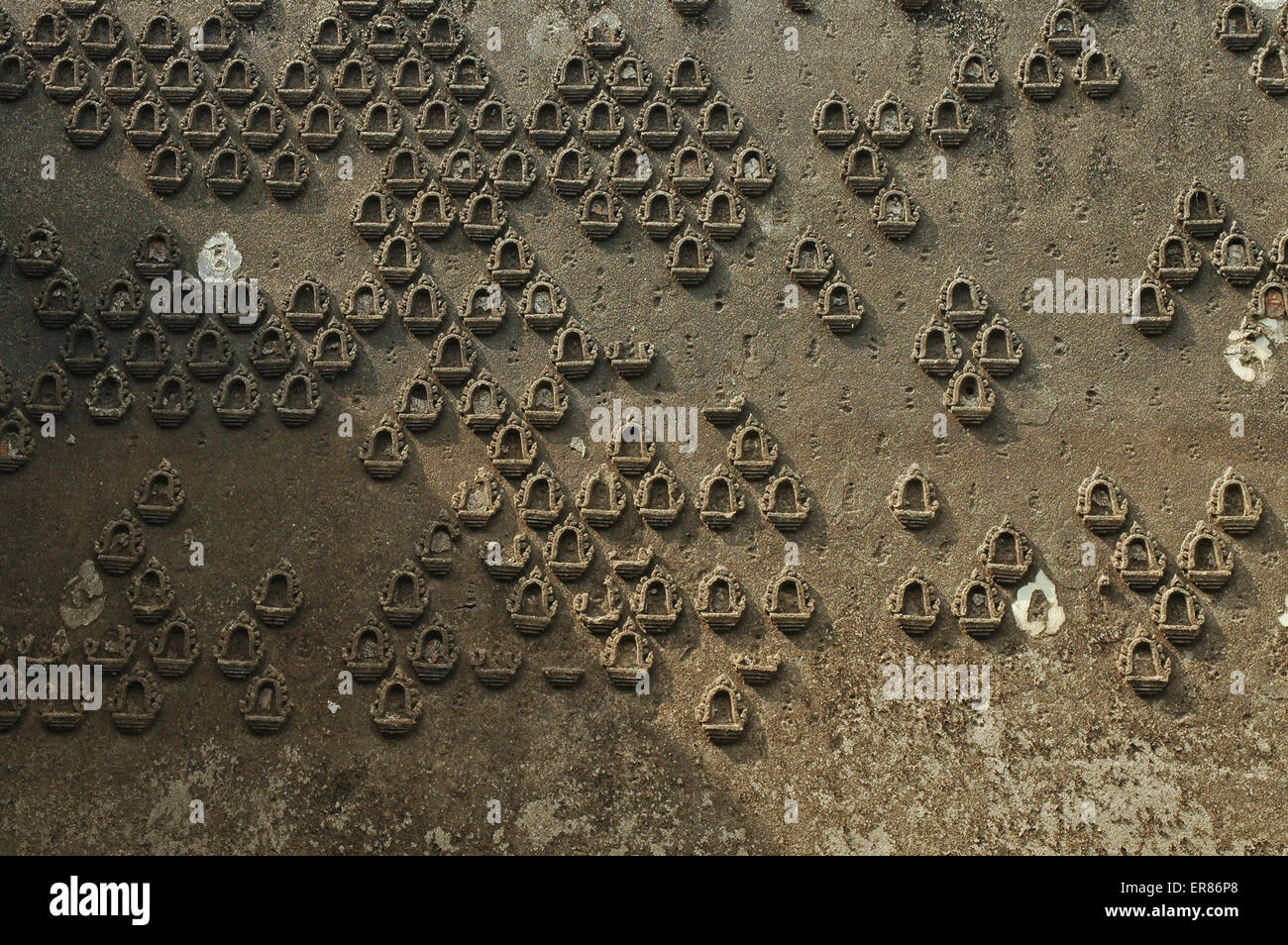 Wall of Buddha amulets in Underwater temple of Sangkhlaburi Thailand Stock Photo