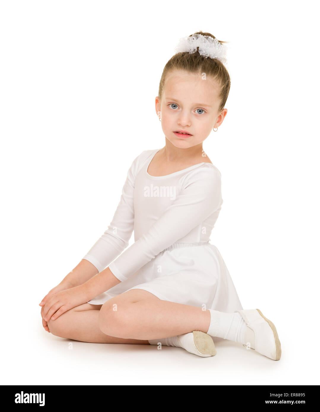 little girl dancing in a white ball gown Stock Photo Alamy