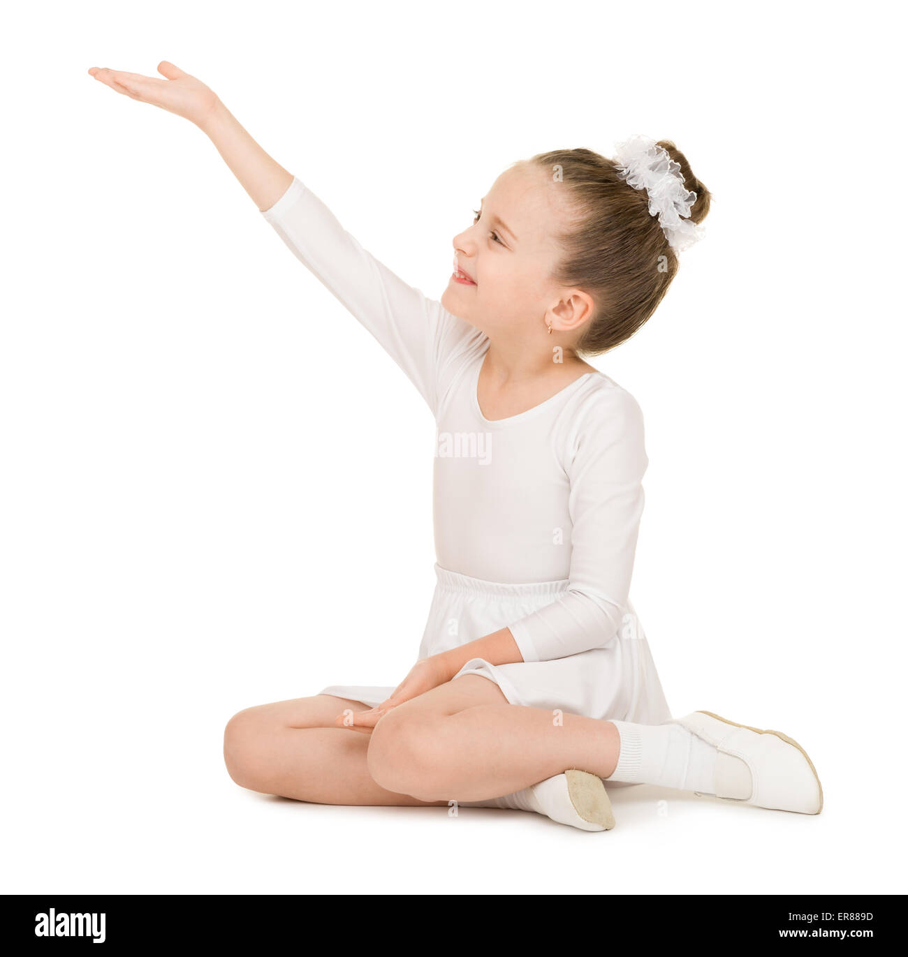 little girl dancing in a white ball gown Stock Photo Alamy