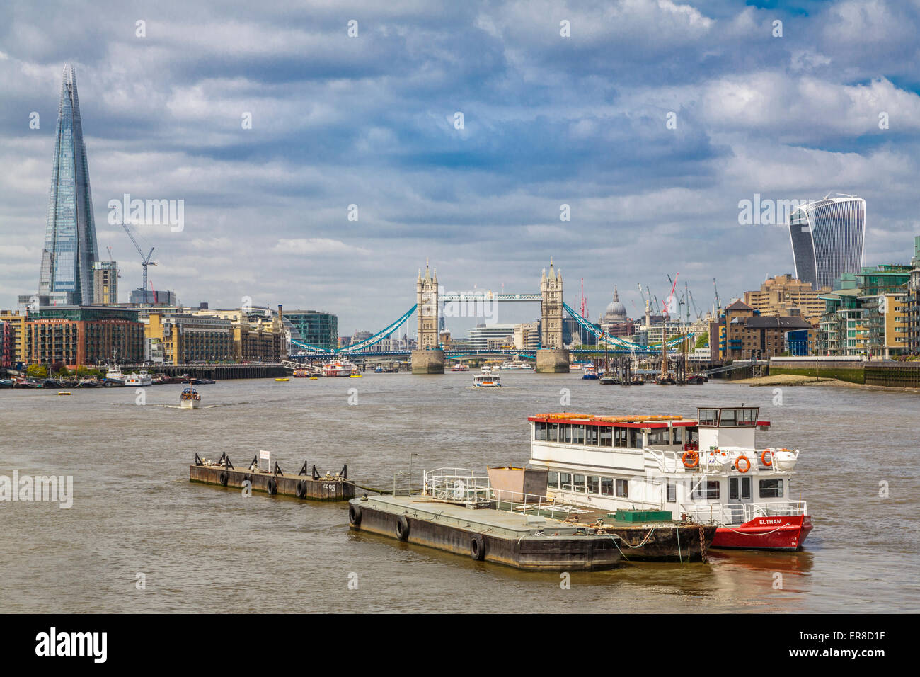 A panorama of the River Thames waterside looking West towards Tower Bridge,The Shard and The Walkie-Talkie, London England UK Stock Photo