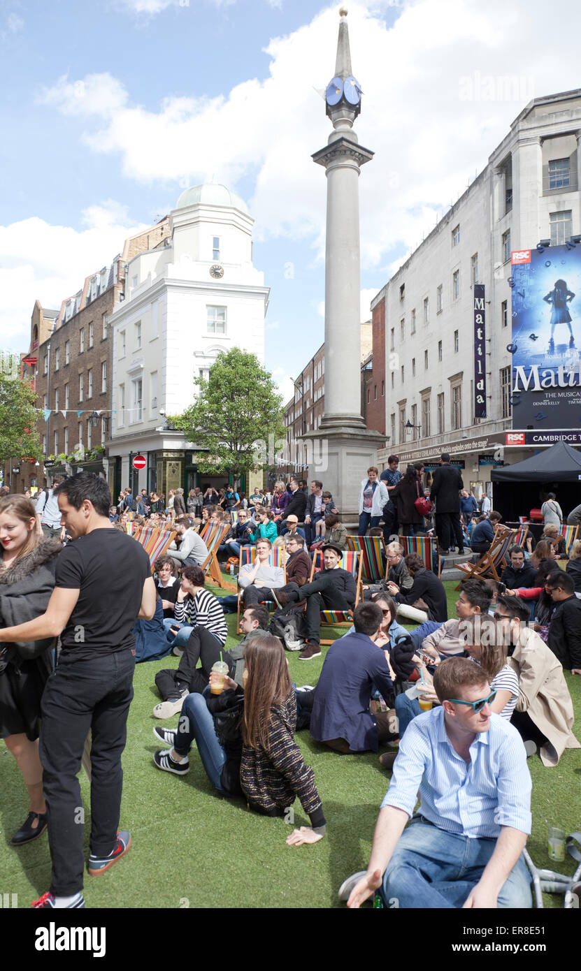 Seven Dials Roundabout Closed off for Concert during Spring Shopping Event in Covent Garden - London UK Stock Photo