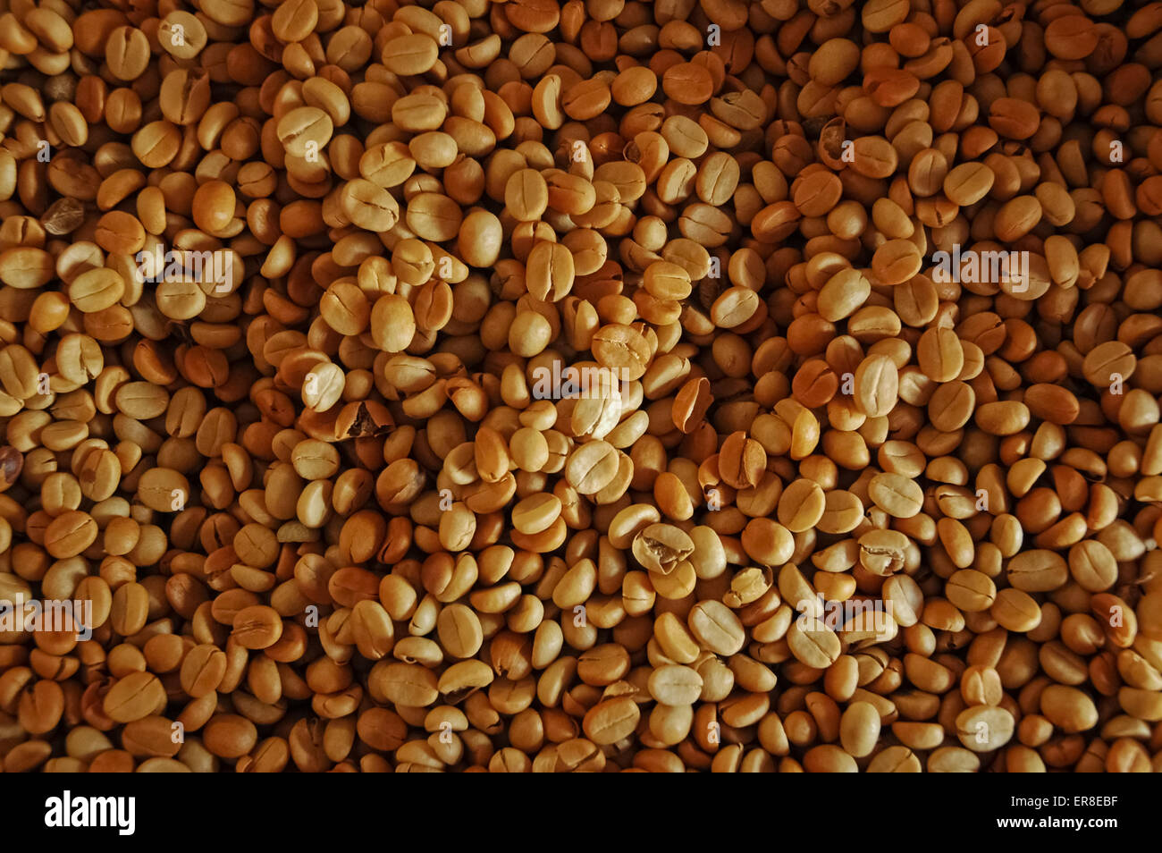 Photo inspiration: Fresh Look at Organic Brown Coffee Beans Stock Photo