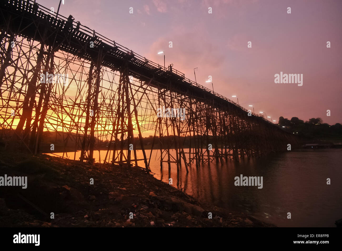 Sunset at the bamboo bridge in a peaceful evening at Sangkhlaburi Western Thailand Stock Photo