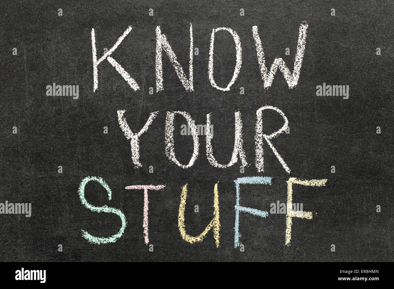 know your stuff phrase handwritten by color chalks on blackboard Stock Photo