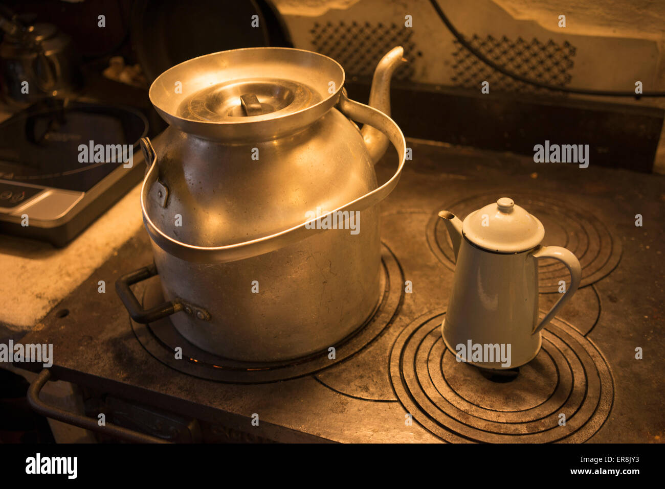 Tea kettle on stove Stock Photo Alamy
