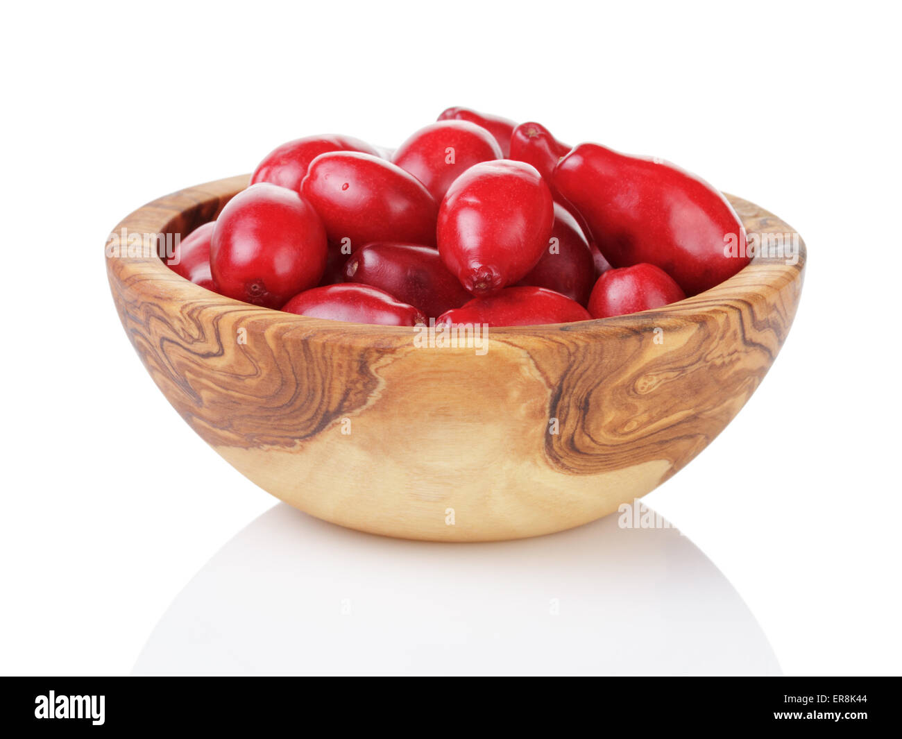 fresh bogwood berries in wood bowl isolated on white Stock Photo