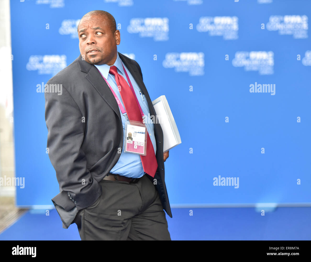 Zurich, Switzerland. 29th May, 2015. FIFA delegate Michael BLEASE (Belize) looks back during arriving at Zurich Hallenstadion for the 2015 FIFA congress. Credit:  thamerpic/Alamy Live News Stock Photo