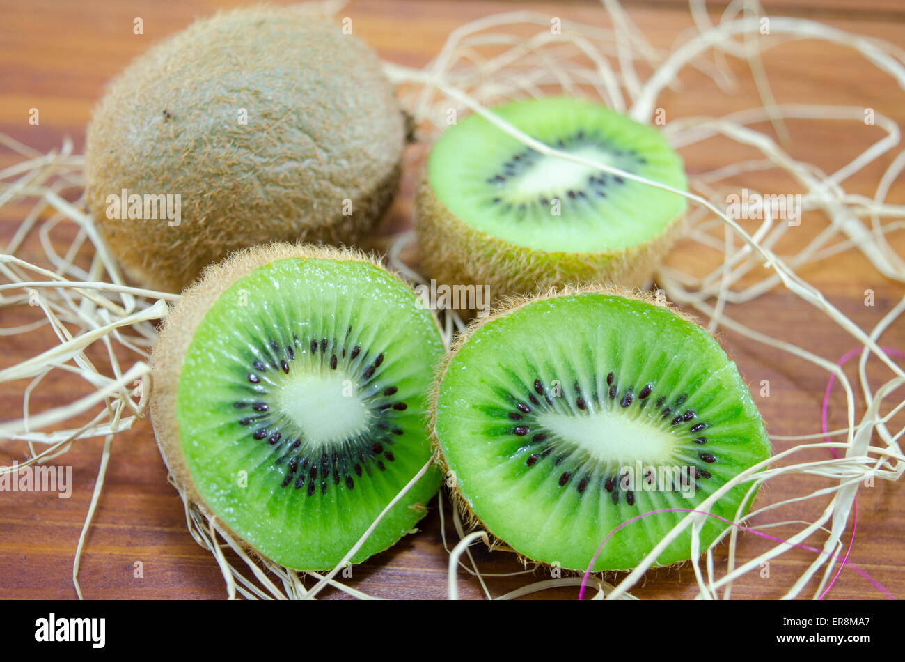 Kiwis fruits green cut sliced half hi-res stock photography and images ...