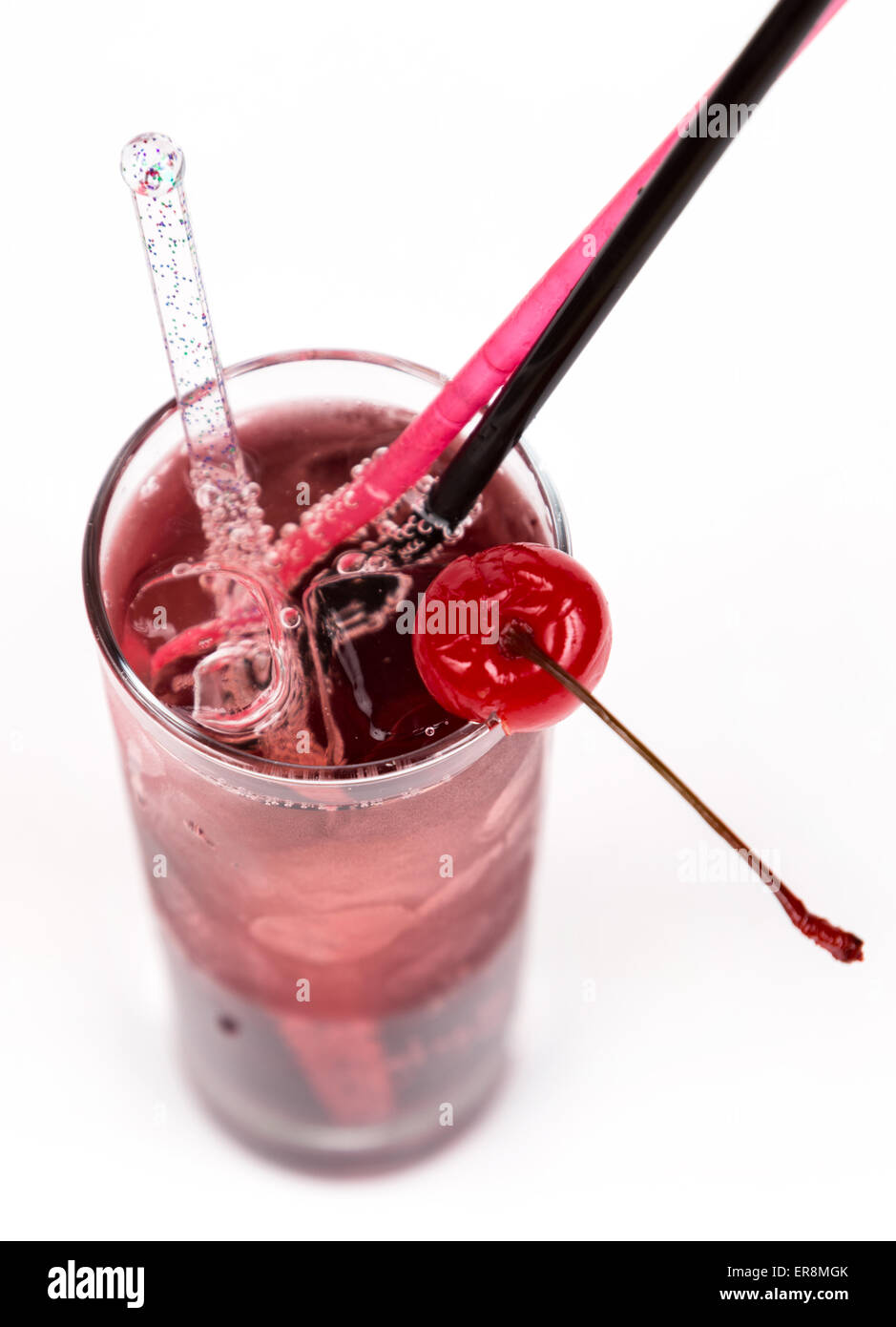 close up freshness cocktail with ice in glass with drinking straw Stock Photo