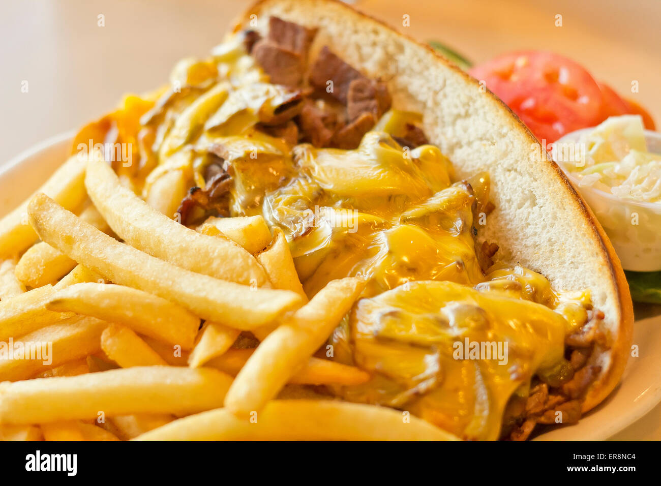 Messy philly cheesesteak onions peppers hires stock photography and