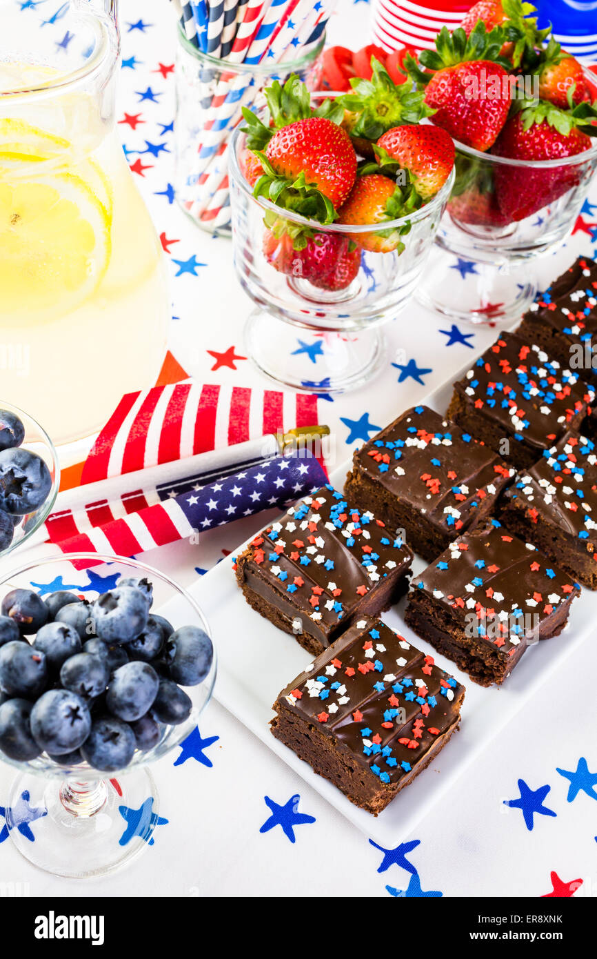 Variety of desserts on the table for July 4th party Stock Photo - Alamy