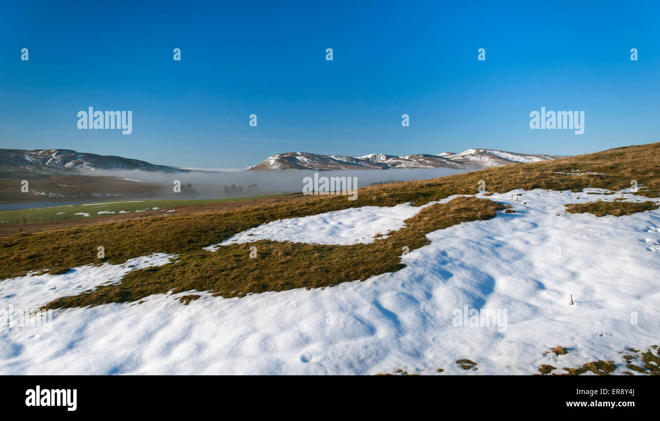 Freezing fog lingering in valley bottoms on a  winter morning, looking towards the Howgill Fells, Cumbria, UK. Stock Photo