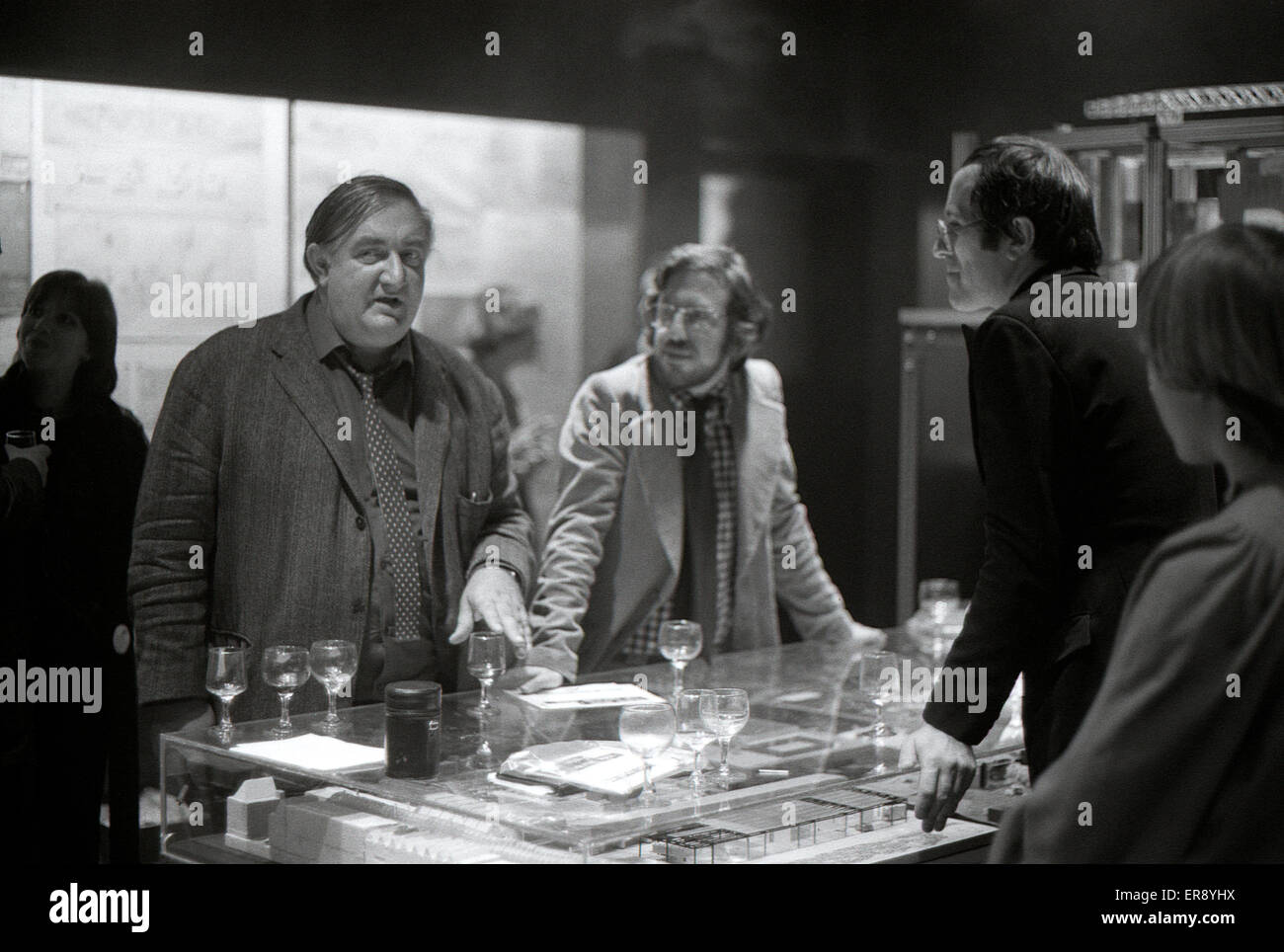 'The Evolving image'  1975 exhibition of Cedric Price's work, Royal Institute of British Architects' Heinz Gallery, 21 Portman Square, London: James Stirling (left), the documentary maker Roger Graef (centre), Peter Cook and Diana Jowsey of Archigram (right) in conversation, London UK   KATHY DEWITT Stock Photo