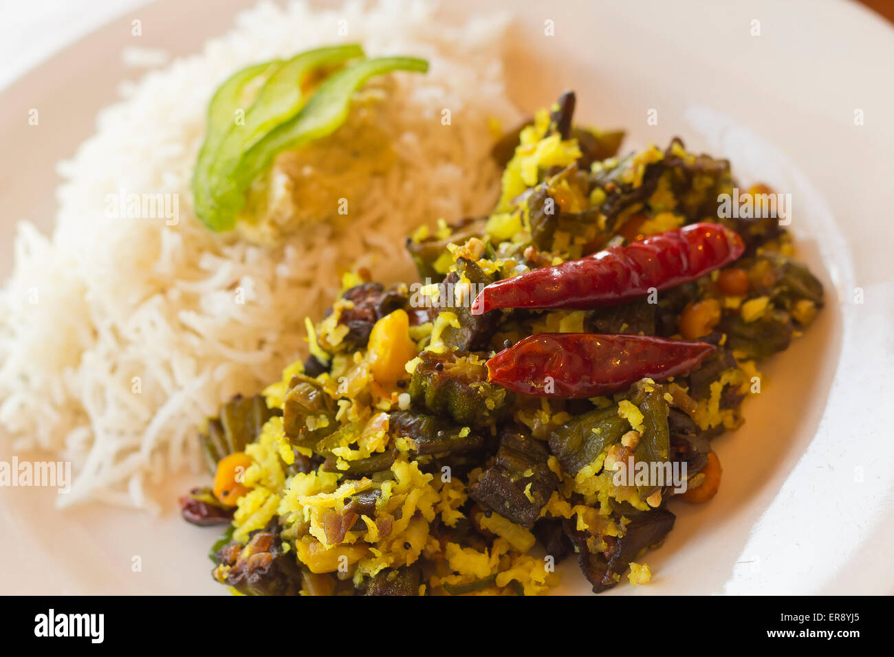 Indian vegetarian fried okra with basmati rice Stock Photo Alamy