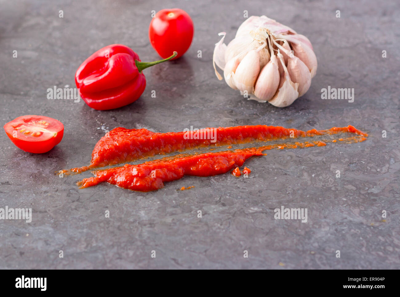 Chilli and Garlic sauce with tomatoes Stock Photo