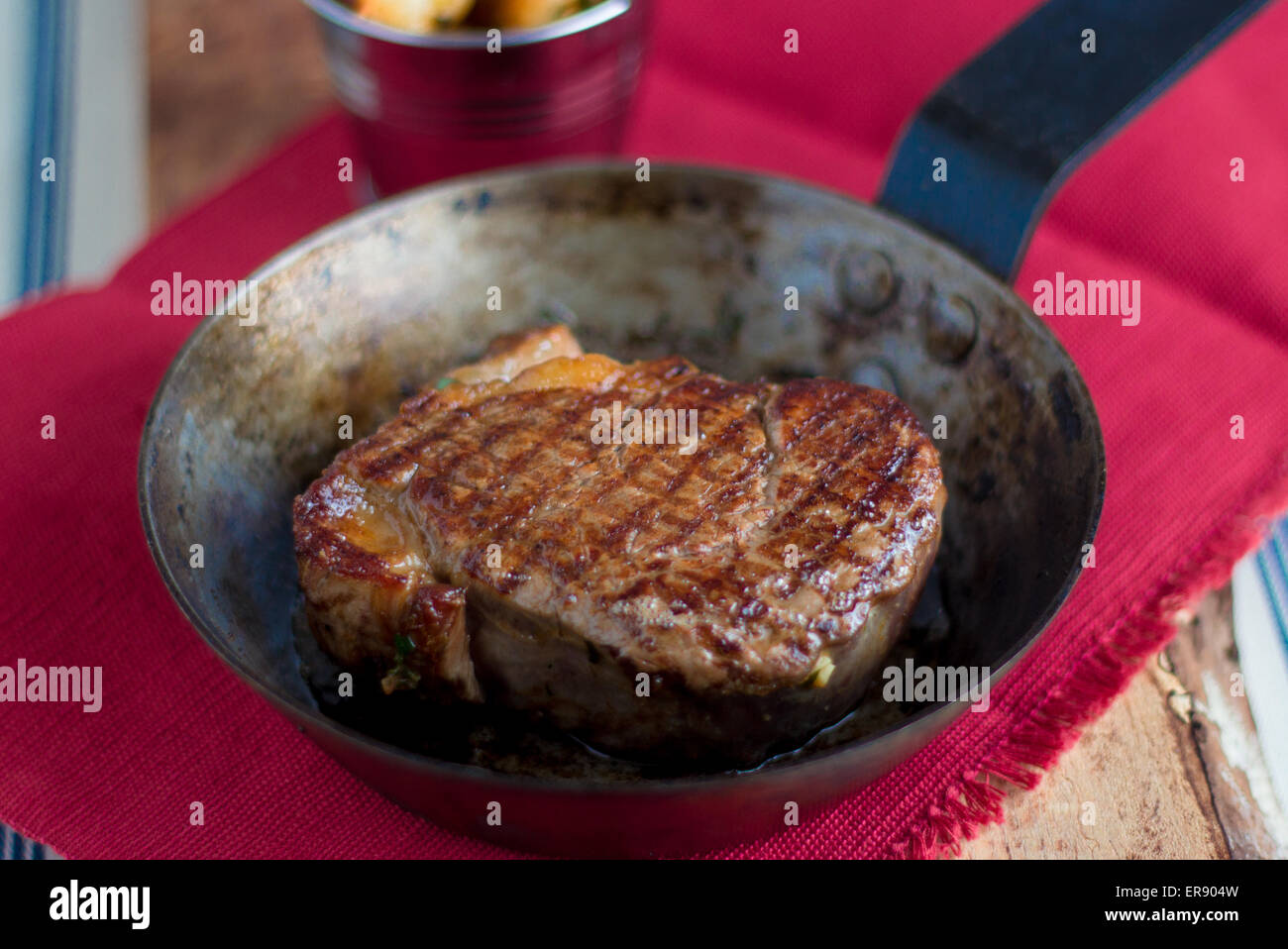 Cooked Steak in a frying pan Stock Photo Alamy