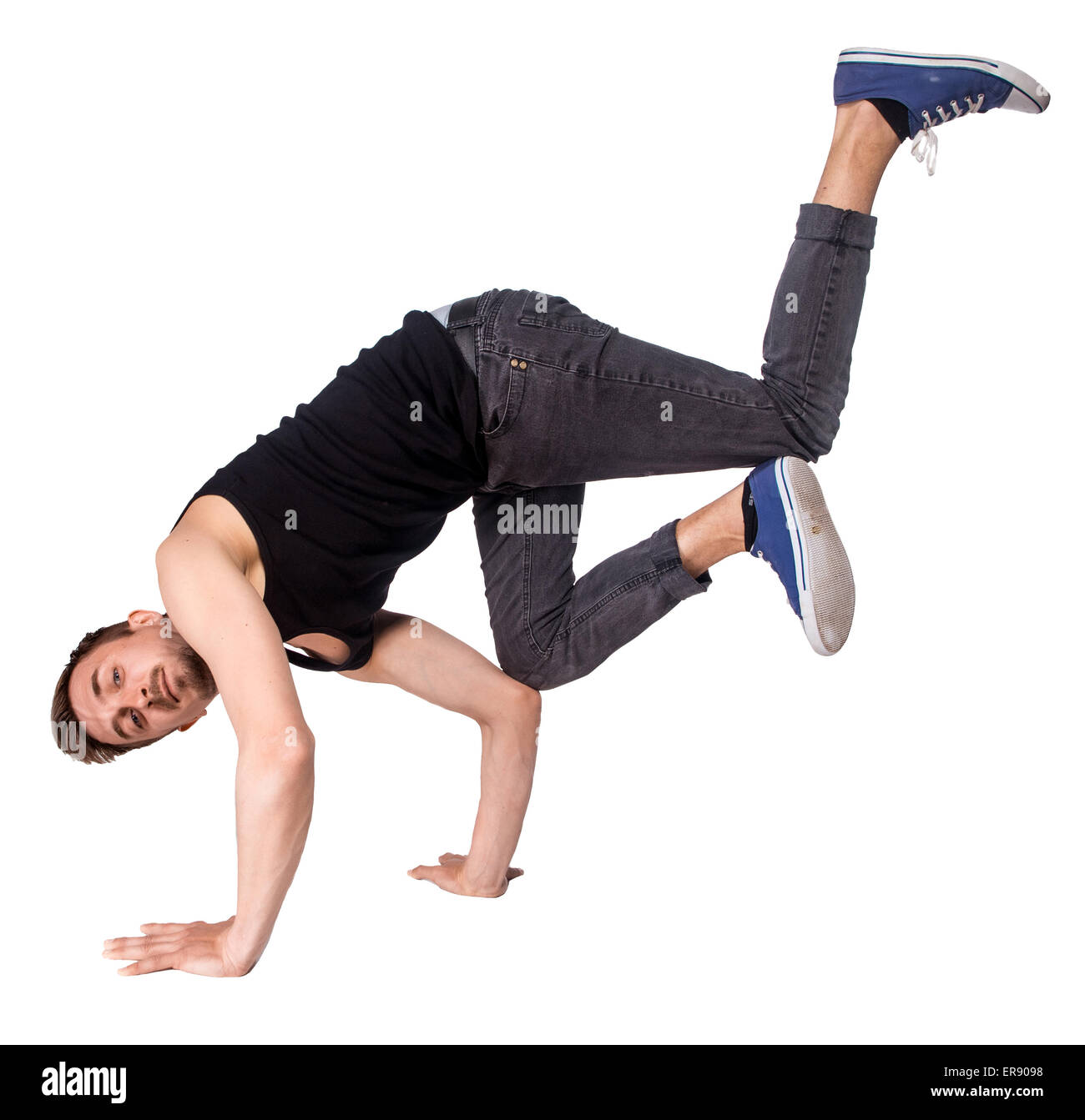 Break dancer doing handstand against  white background Stock Photo