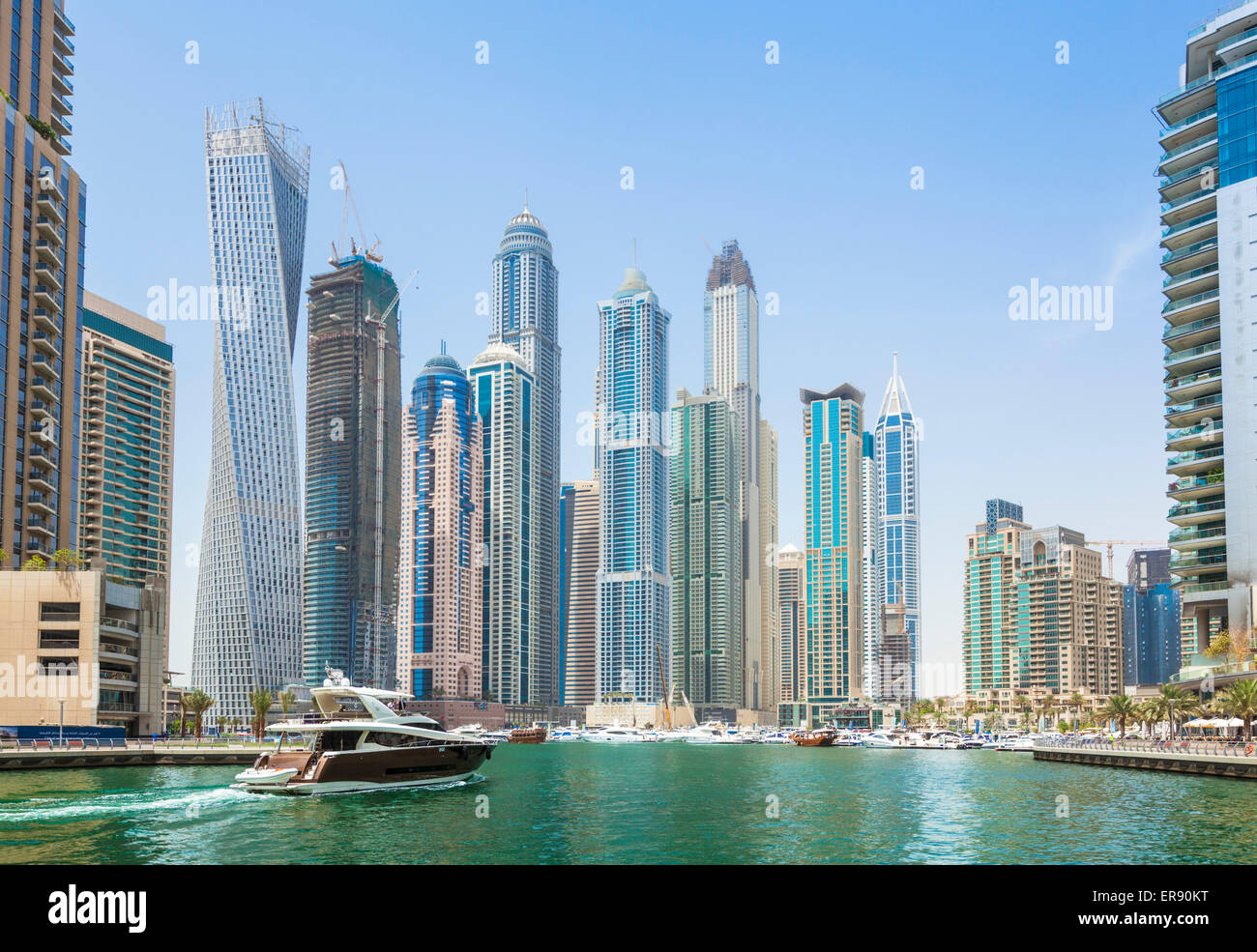 Dubai Marina Skyline and harbour with luxury yacht Dubai City United Arab Emirates UAE Middle east Stock Photo