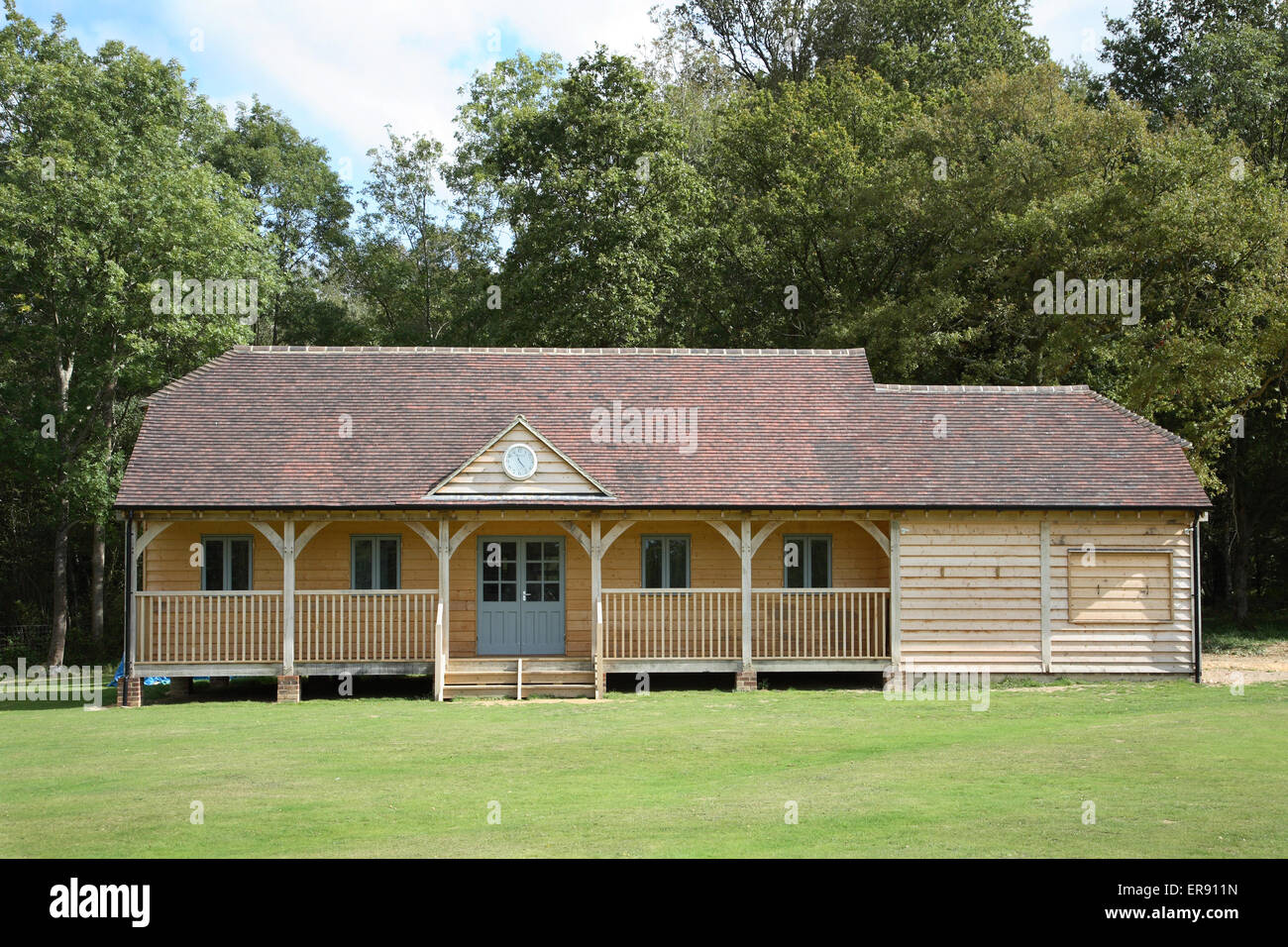 A traditionally built timber English cricket pavilion building at Sheffield Park in Southern England Stock Photo