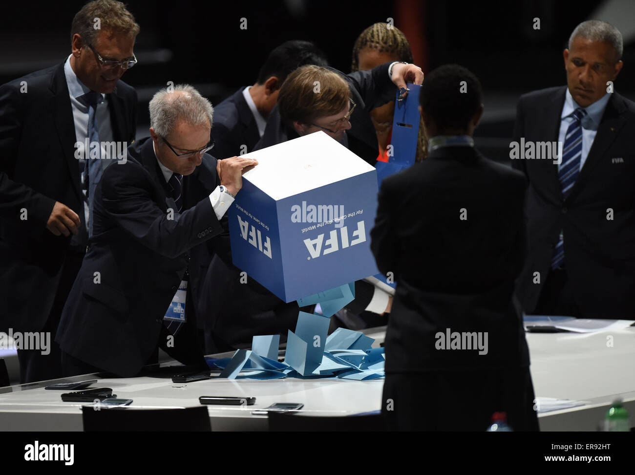 Zurich, Switzerland. 29th May, 2015. Notaries empty ballot boxes after the election of the FIFA president at the 65th FIFA Congress at the Hallenstadion in Zurich, Switzerland, 29 May 2015. Photo: Patrick Seeger/dpa/Alamy Live News Stock Photo
