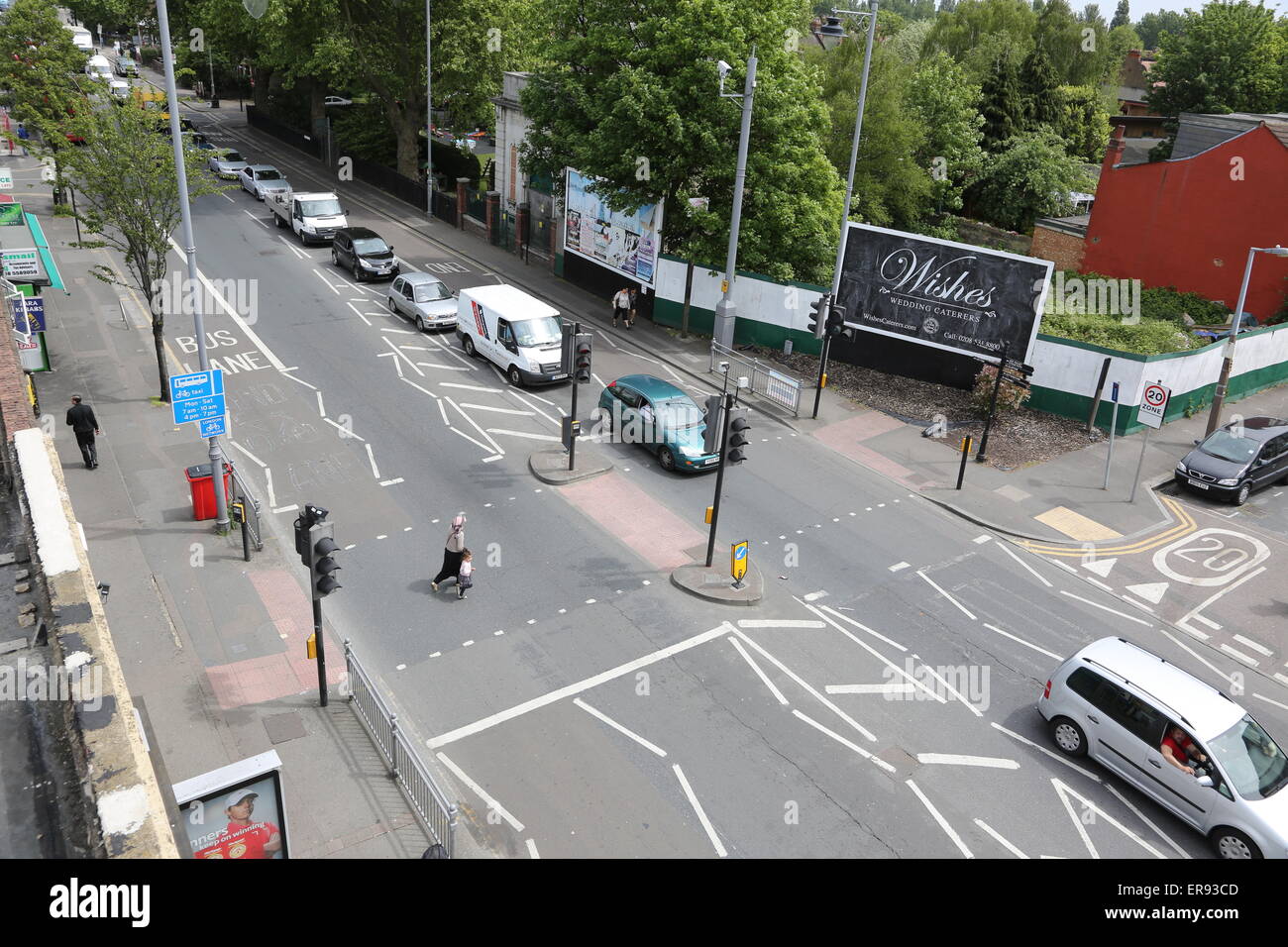 A pedestrian crossing on Lee Bridge Road in the north London Borough of Waltham Forest. Shows traffic lights and queuing traffic Stock Photo
