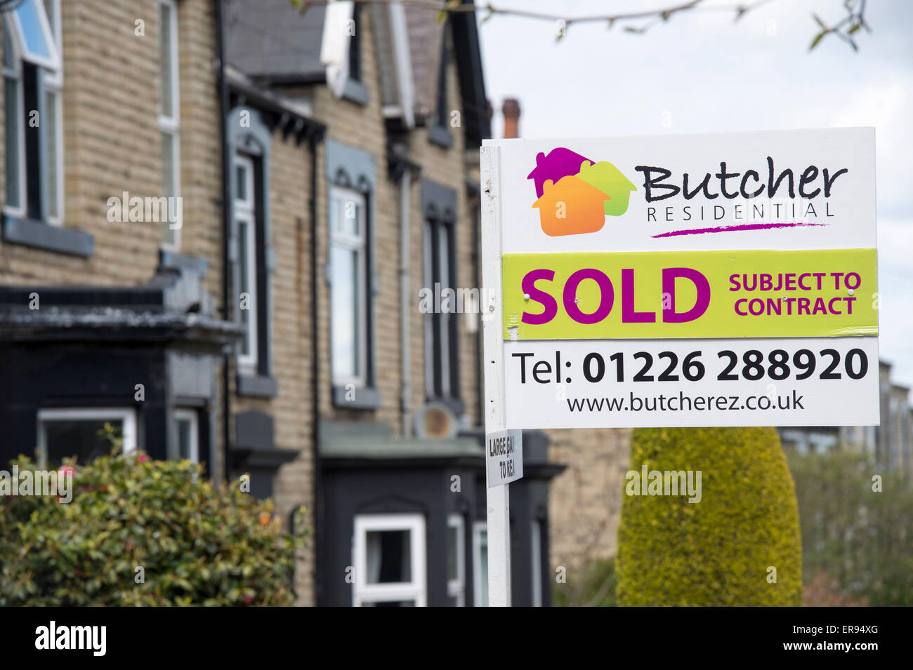 Butcher Residential Sold board outside a property in Barnsley Stock Photo Alamy