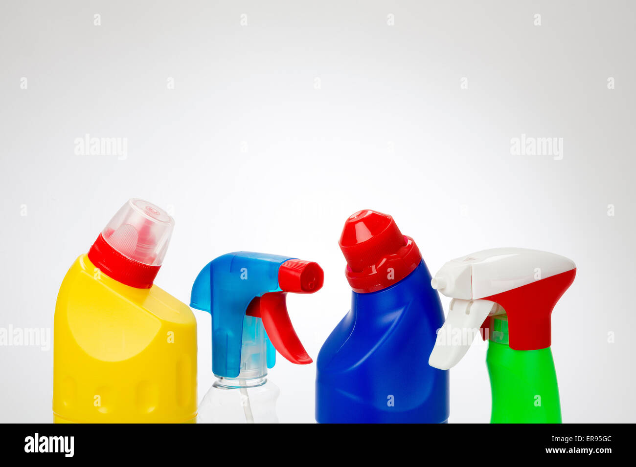 Plastic Cleaning Product Bottles with spot light background Stock Photo