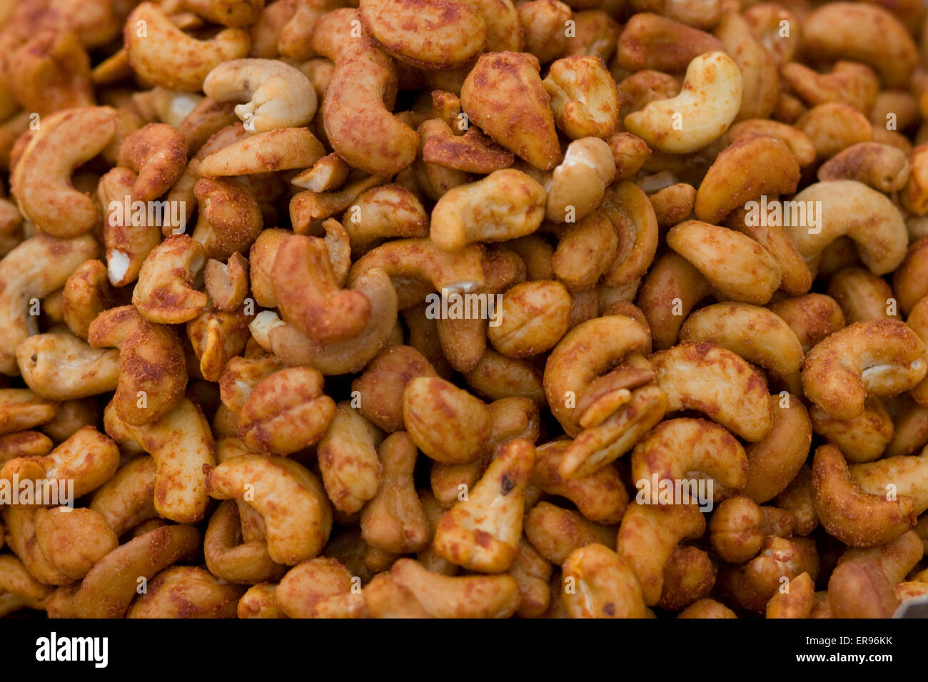 cashew Nuts coated in Chili Powder Stock Photo Alamy
