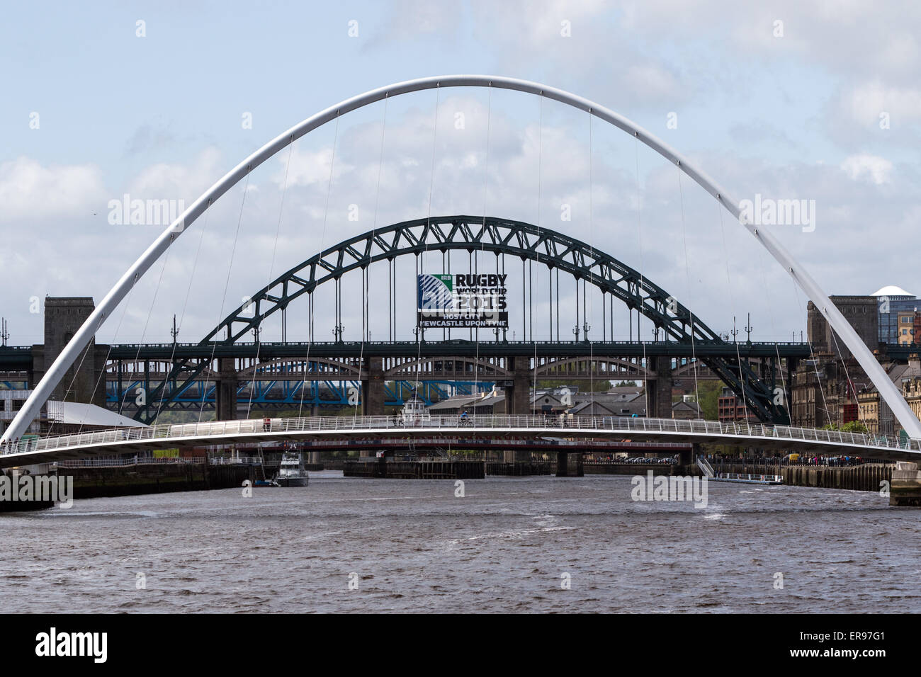 The River Tyne in Newcastle with the Millennium Bridge and beyond it the Tyne Bridge and High Level Bridge Stock Photo