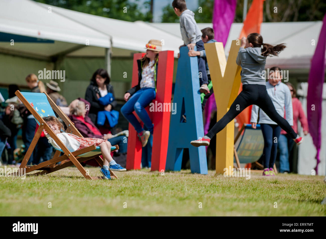 Hay on Wye, UK. Thursday 28 May 2015  Pictured: Young children enjoying the sunshine at Hay Re: The 2015 Hay Festival takes place in Hay on Wye, Powys, Wales Stock Photo