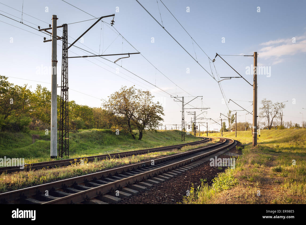 Cargo train platform at sunset. Railroad in Ukraine. Railway station Stock Photo