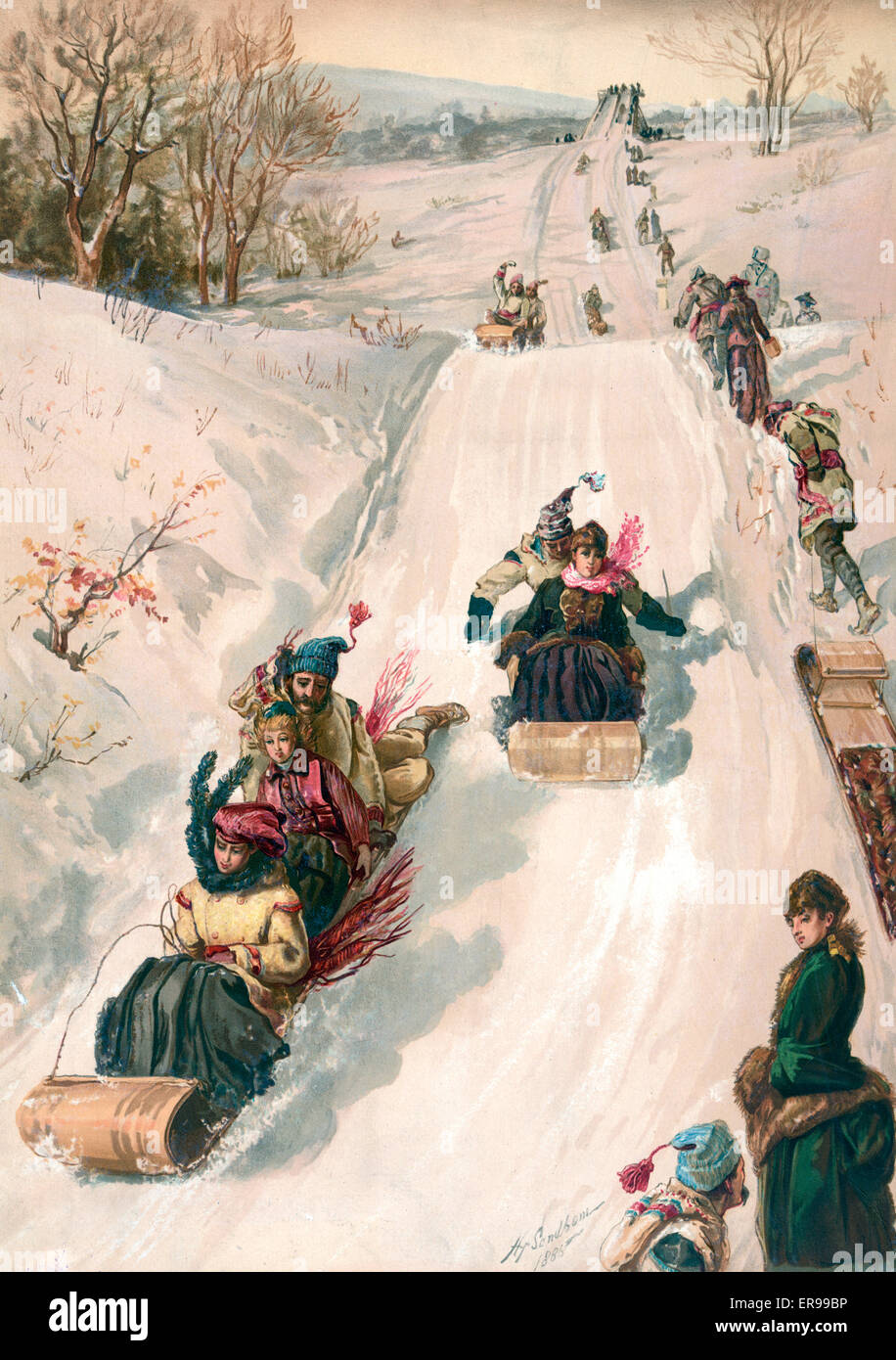 Tobogganing in the snow in winter Stock Photo - Alamy