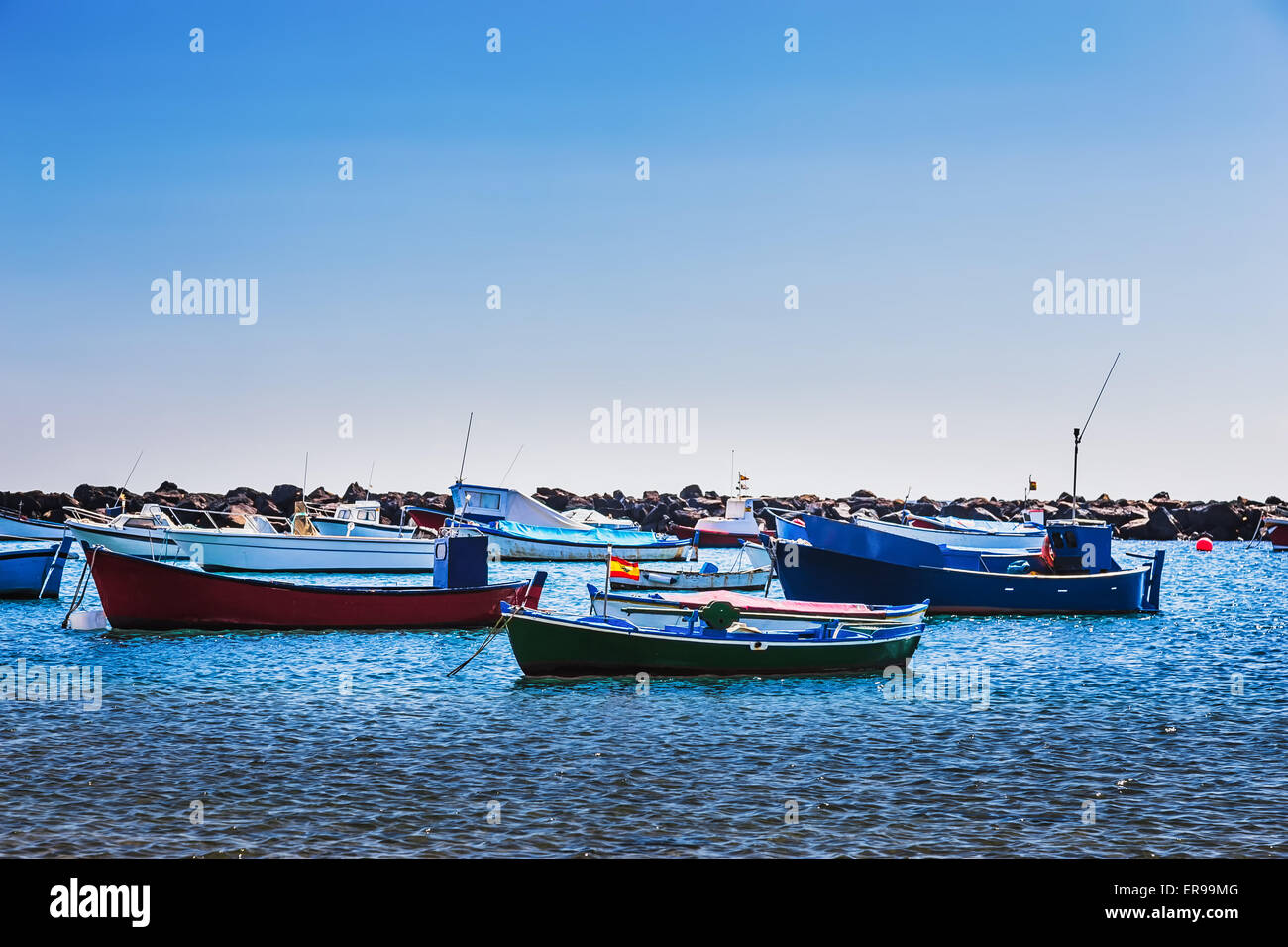 Boats on the water in harbor or port Stock Photo