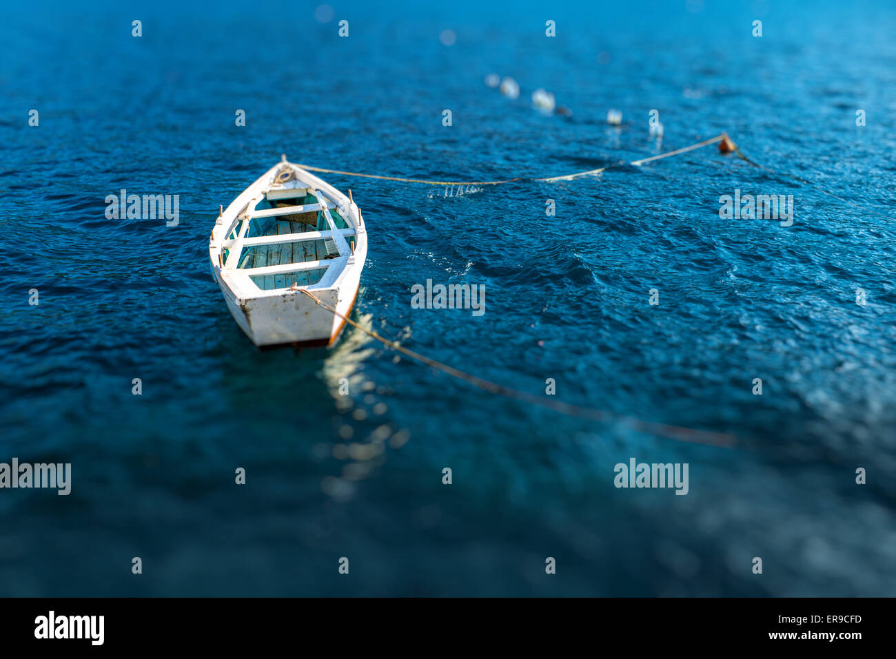 Lonely boat floating Stock Photo