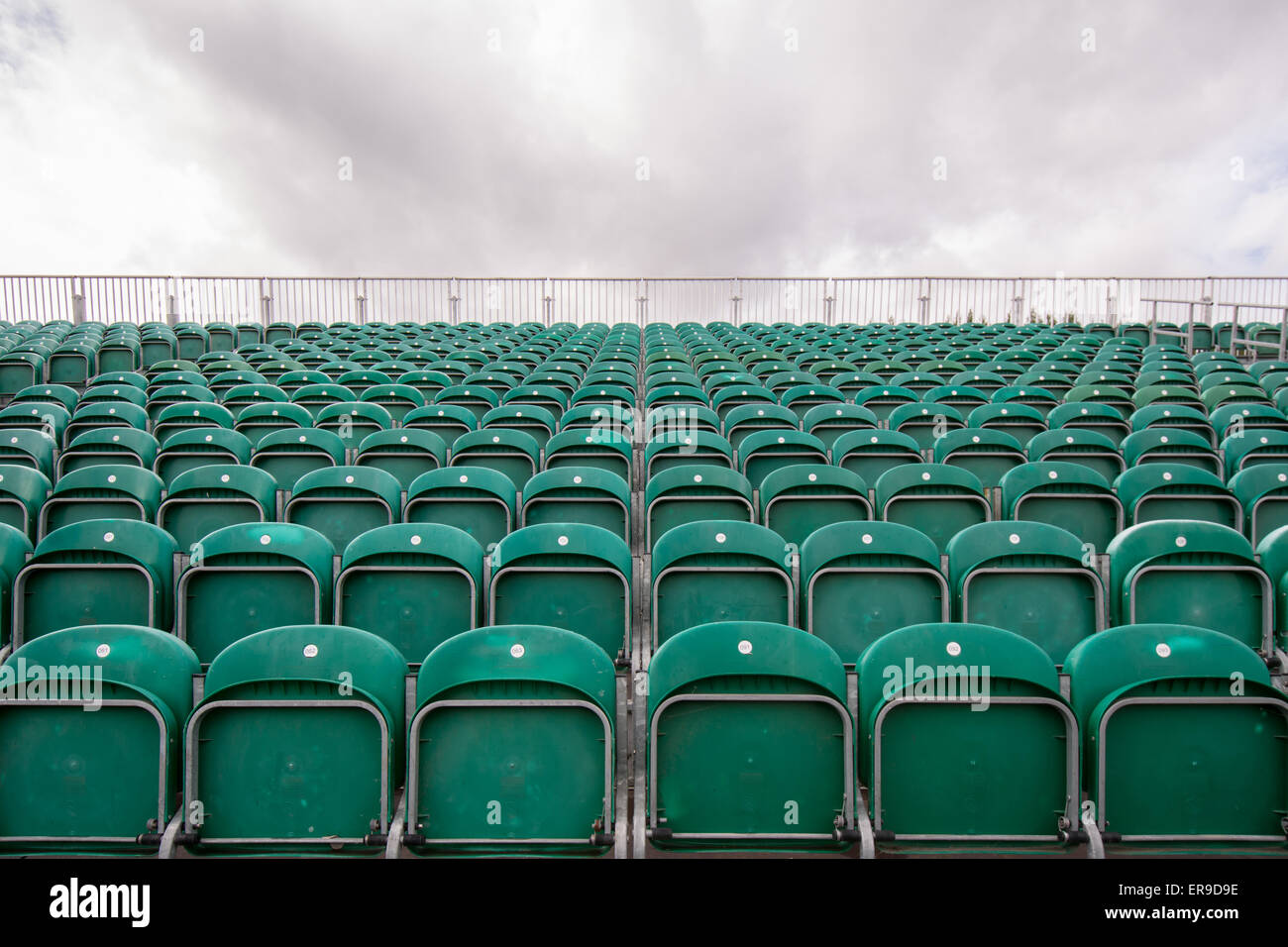 Empty green stadium seats Stock Photo - Alamy