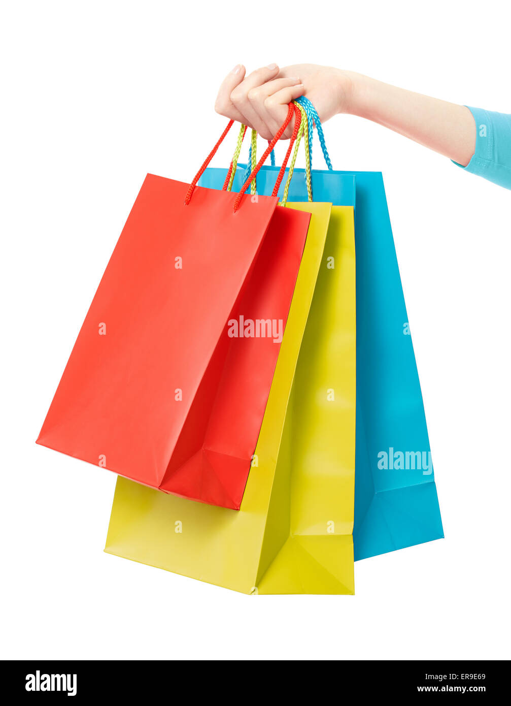 Woman hand holding shopping bags Stock Photo