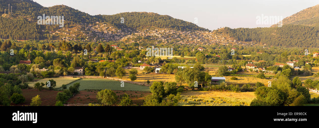 Panoramic view of historical ruined ghost village Kayakoy near Fethiye, Turkey Stock Photo