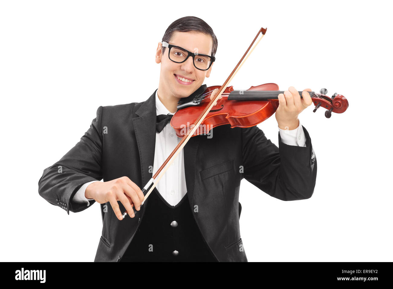 Cheerful young violinist playing an acoustic violin isolated on white background Stock Photo