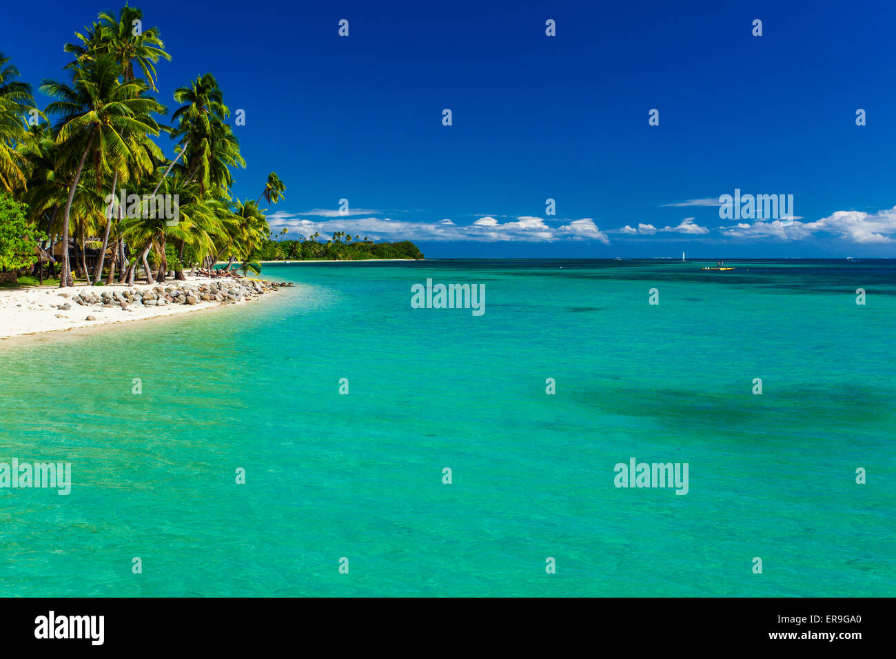 Tropical island in Fiji with sandy beach and pristine water Stock Photo