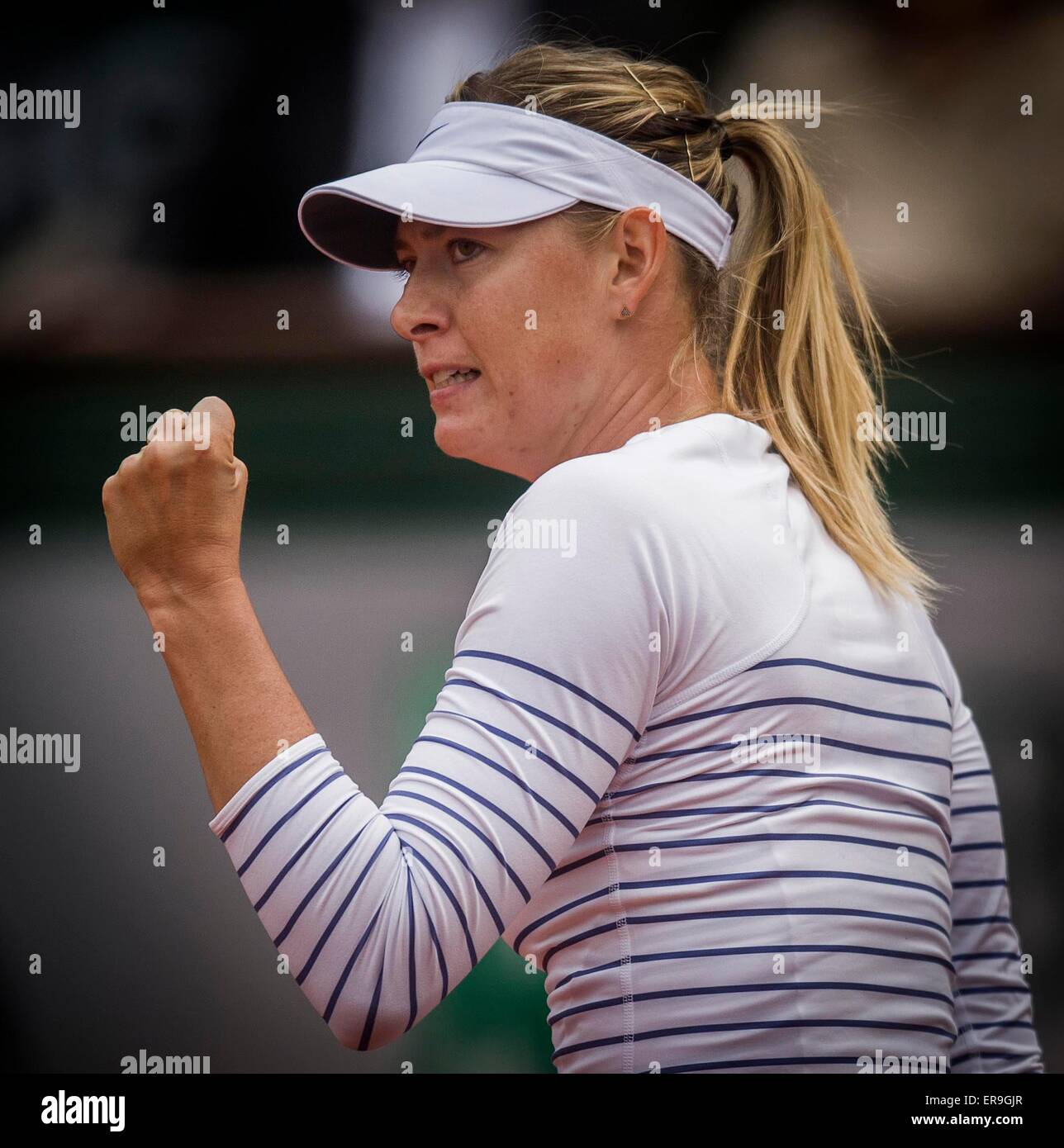 Paris, France. 29th May, 2015. Maria Sharapova of Russia reacts during the women's singles 3rd round match against Samantha Stosur of Australia at the 2015 French Open tennis tournament in Paris, France, on May 29, 2015. Maria Sharapova won 2-0. Credit:  Chen Xiaowei/Xinhua/Alamy Live News Stock Photo