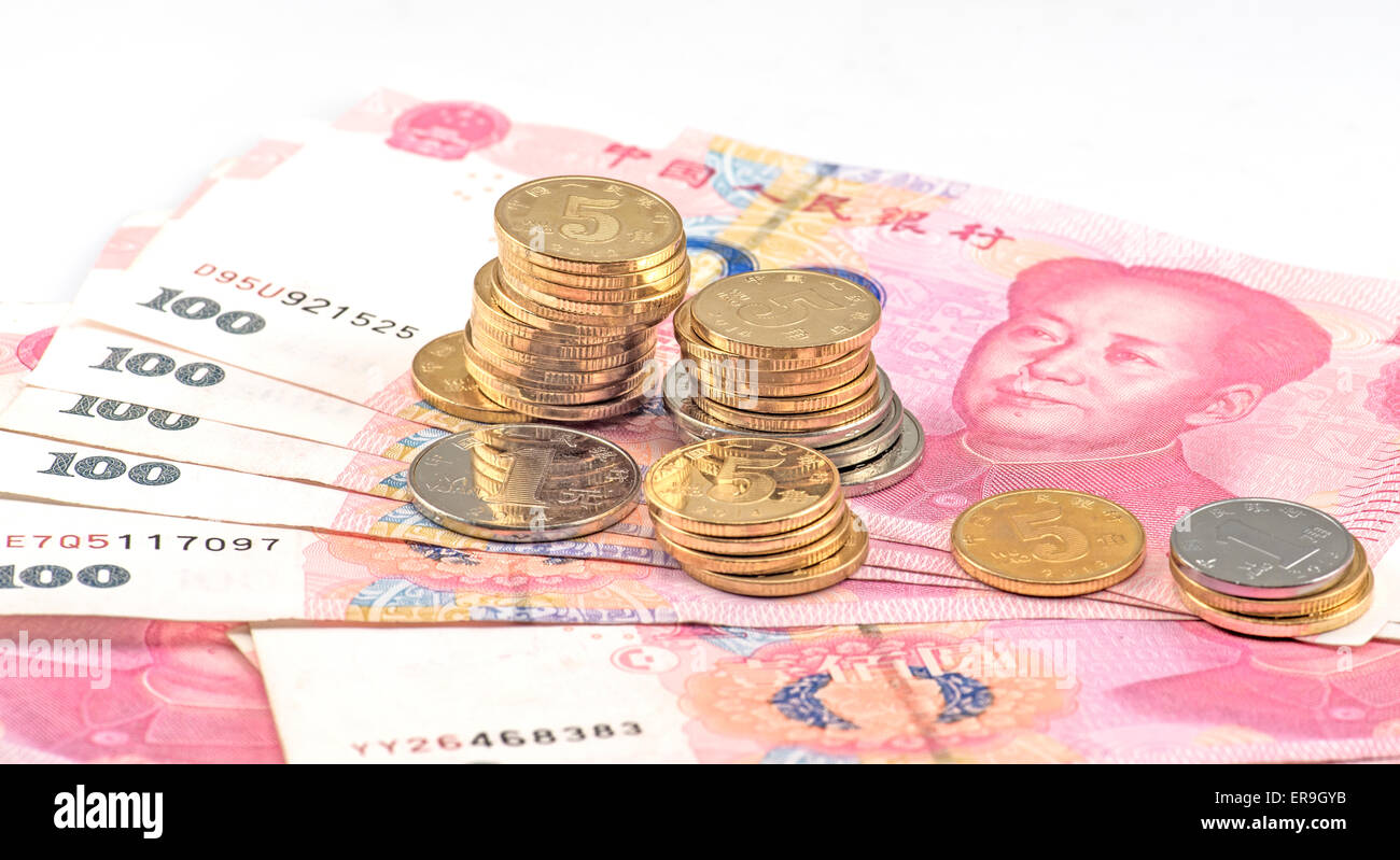 Chinese banknotes and coins Stock Photo