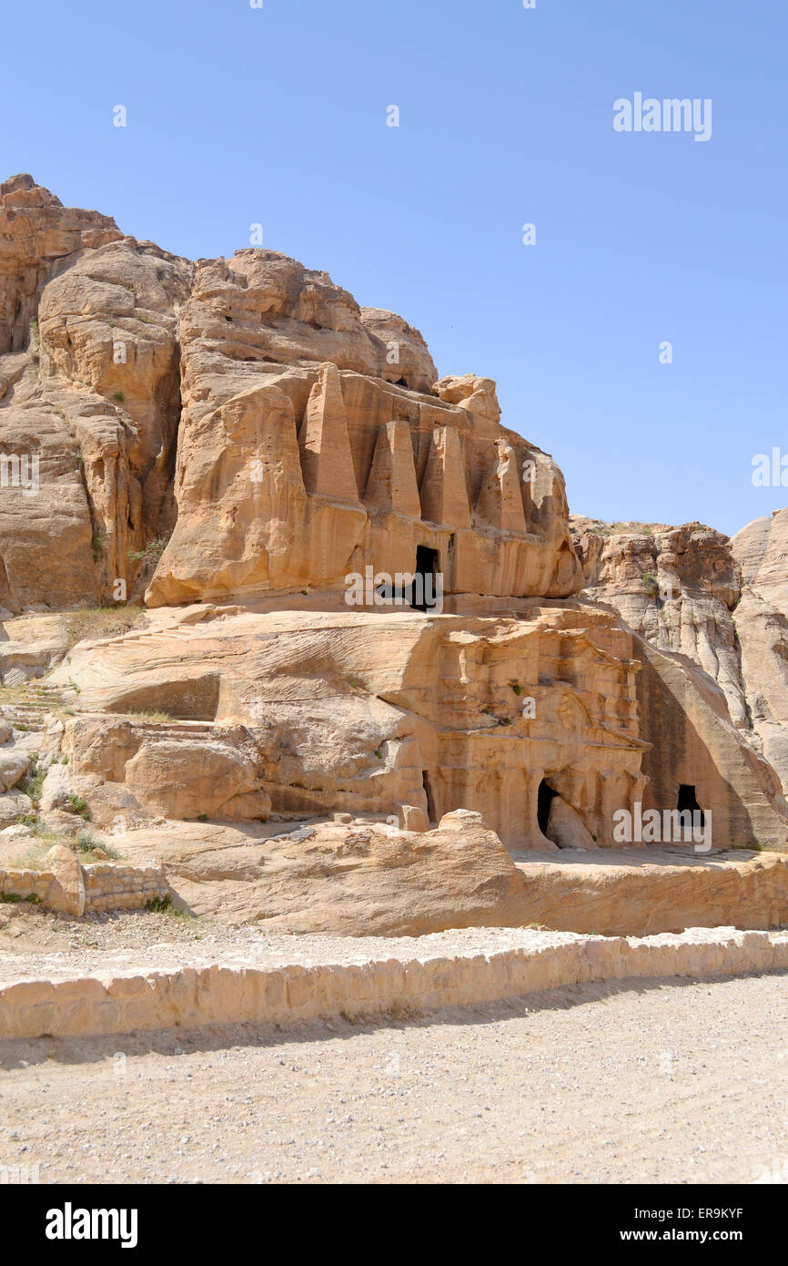 Nabataean caves & sculptures on the way to the ancient city of Petra. Stock Photo