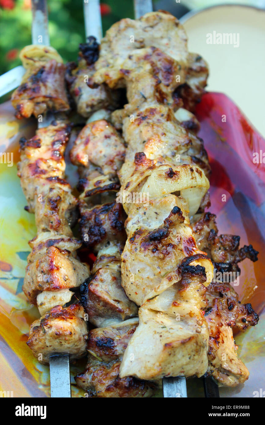 appetizing barbecue on the plate with great pieces of meat Stock Photo