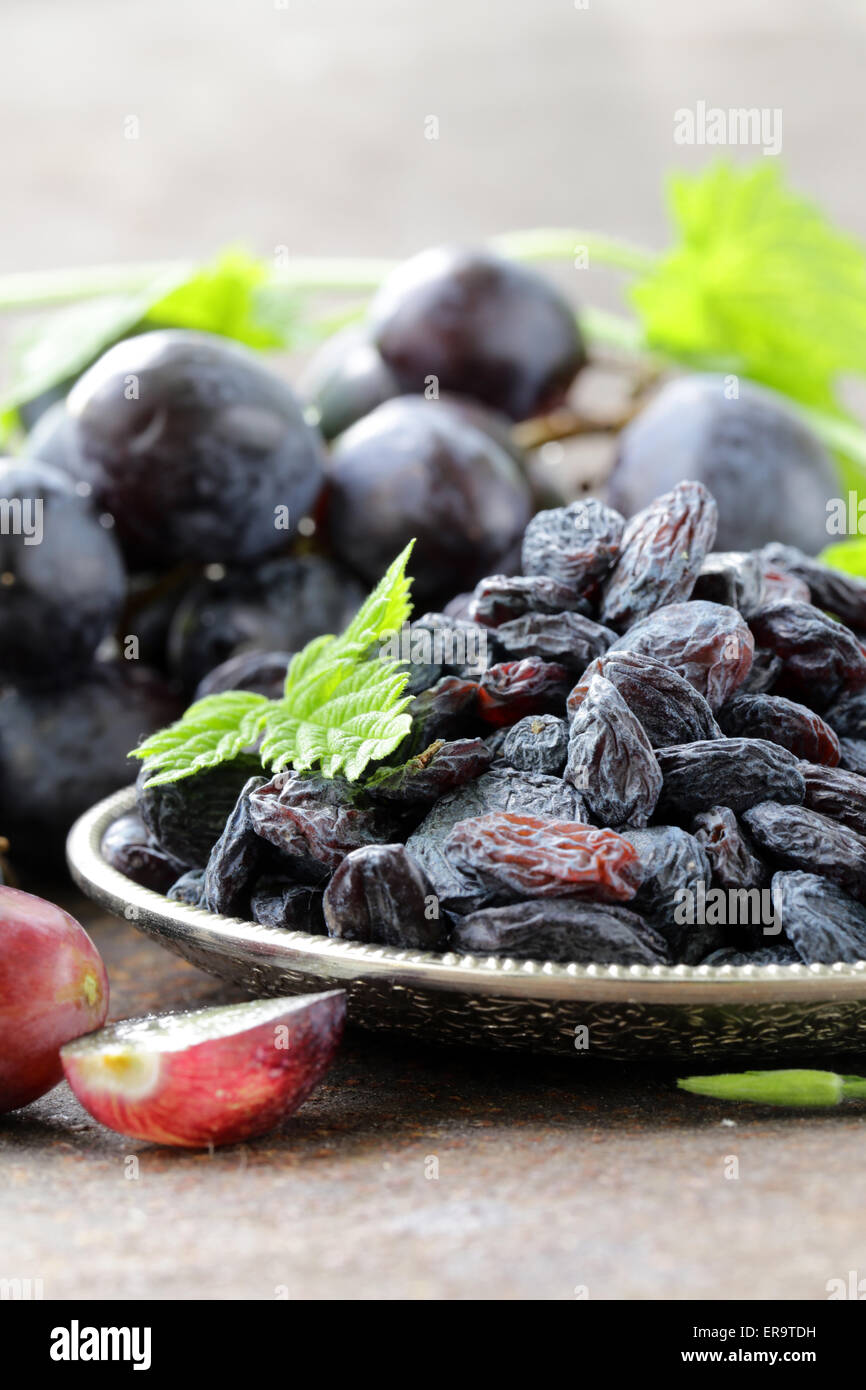 Natural organic dried grapes raisins, rustic still life Stock Photo Alamy