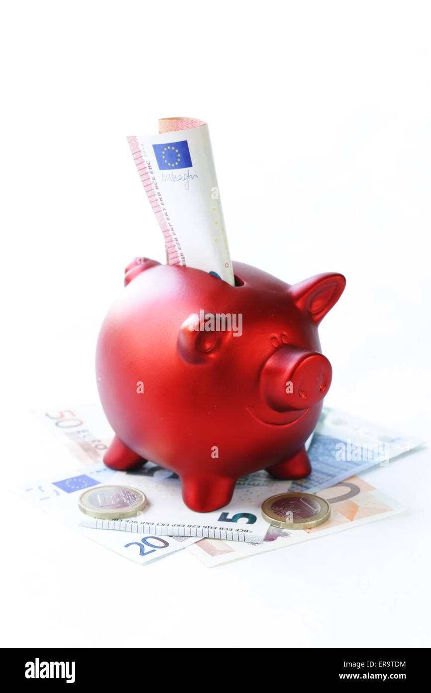red piggy bank with euro banknotes and coins Stock Photo - Alamy