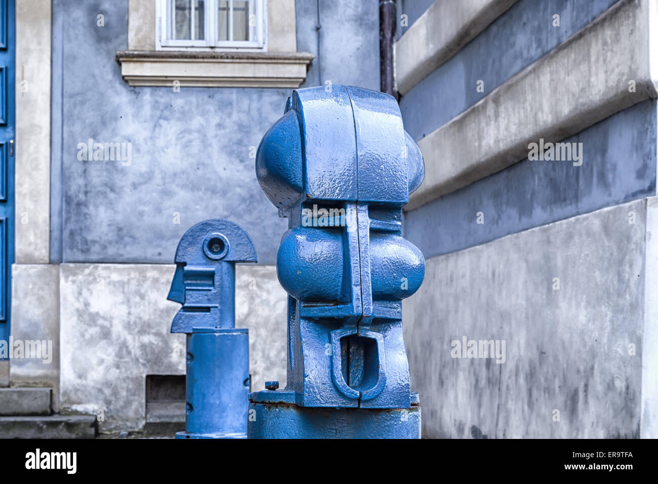 The light blue metal Cubist Bollards in Malostranske namesti (Little Quarter Square) in Prague Stock Photo